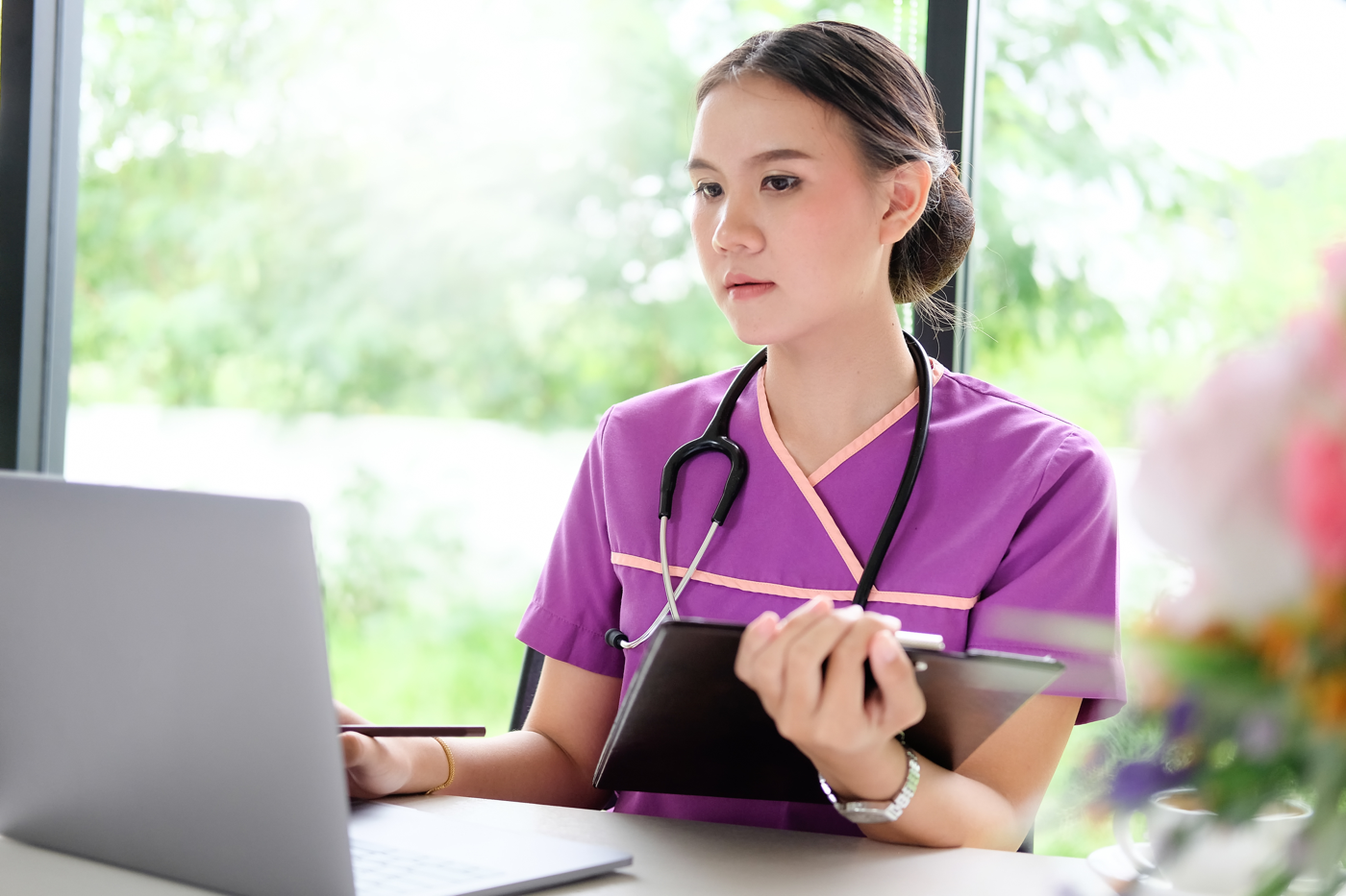 Nurse taking notes